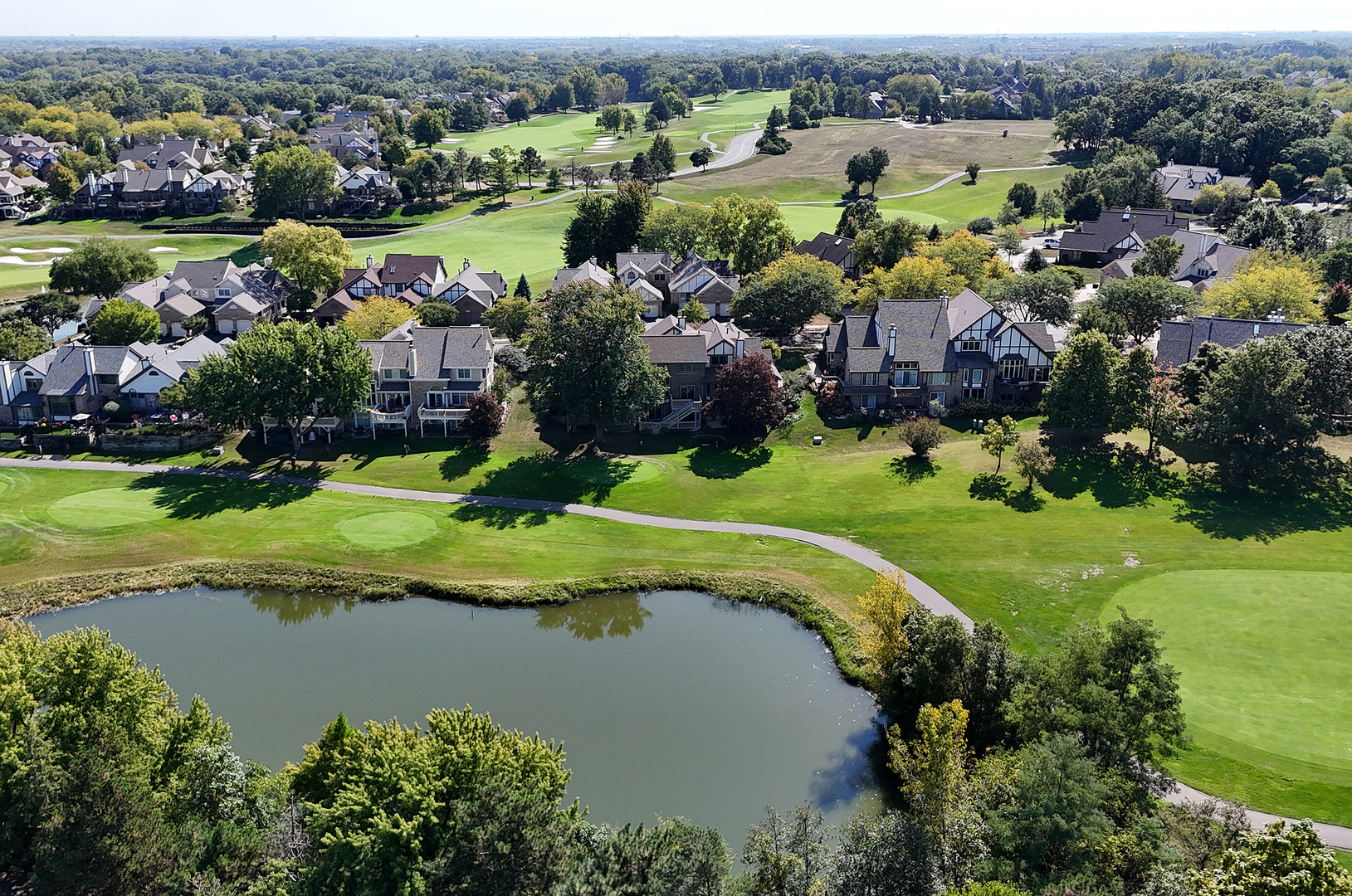 10534 Golf Road Orland Park, IL 60462 - Photo 43 of 54 an aerial view of lake residential houses with outdoor space and seating