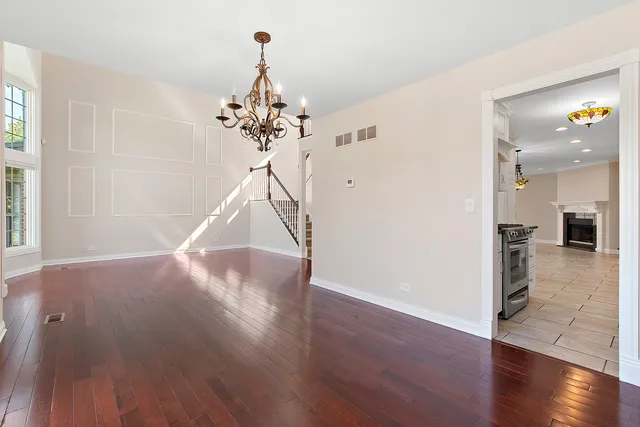 a view of a livingroom with wooden floor