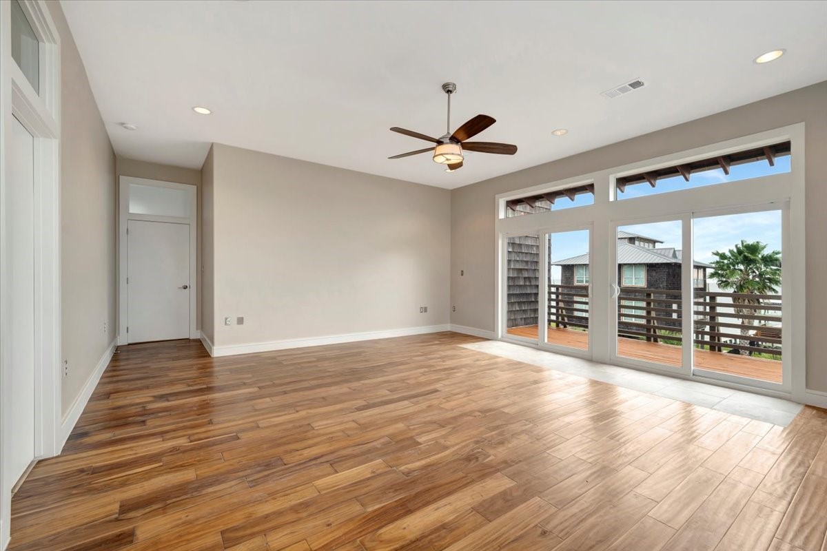 1202 Todville Road Seabrook, TX 77586 - Photo 34 of 45 A stunning view unfolds through the sliding glass doors, where an open-concept space with rich wood floors seamlessly blends with the tranquil beauty of water vistas beyond.
A stunning view unfolds through the sliding glass doors, where an open-concept space with rich hardwood floors seamlessly blends with the tranquil beauty of water vistas beyond.
A stunning view unfolds through the sliding glass doors, where an open-concept space with rich hardwood floors seamlessly blends wit