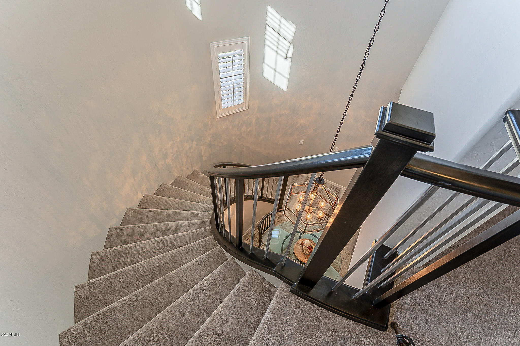 3935 East Rough Rider Road, Unit 1337 Phoenix, AZ 85050 - Photo 46 of 57 Rounded Stairway Down