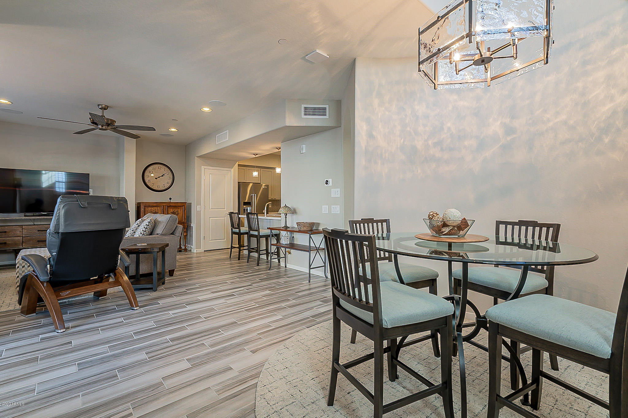 3935 East Rough Rider Road, Unit 1337 Phoenix, AZ 85050 - Photo 47 of 57 a living room with furniture and wooden floor