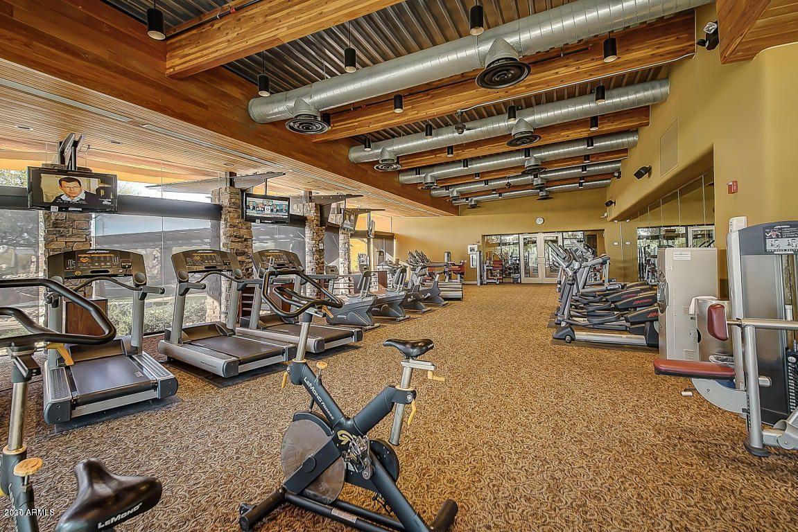3935 East Rough Rider Road, Unit 1337 Phoenix, AZ 85050 - Photo 55 of 57 a view of a room with gym equipment