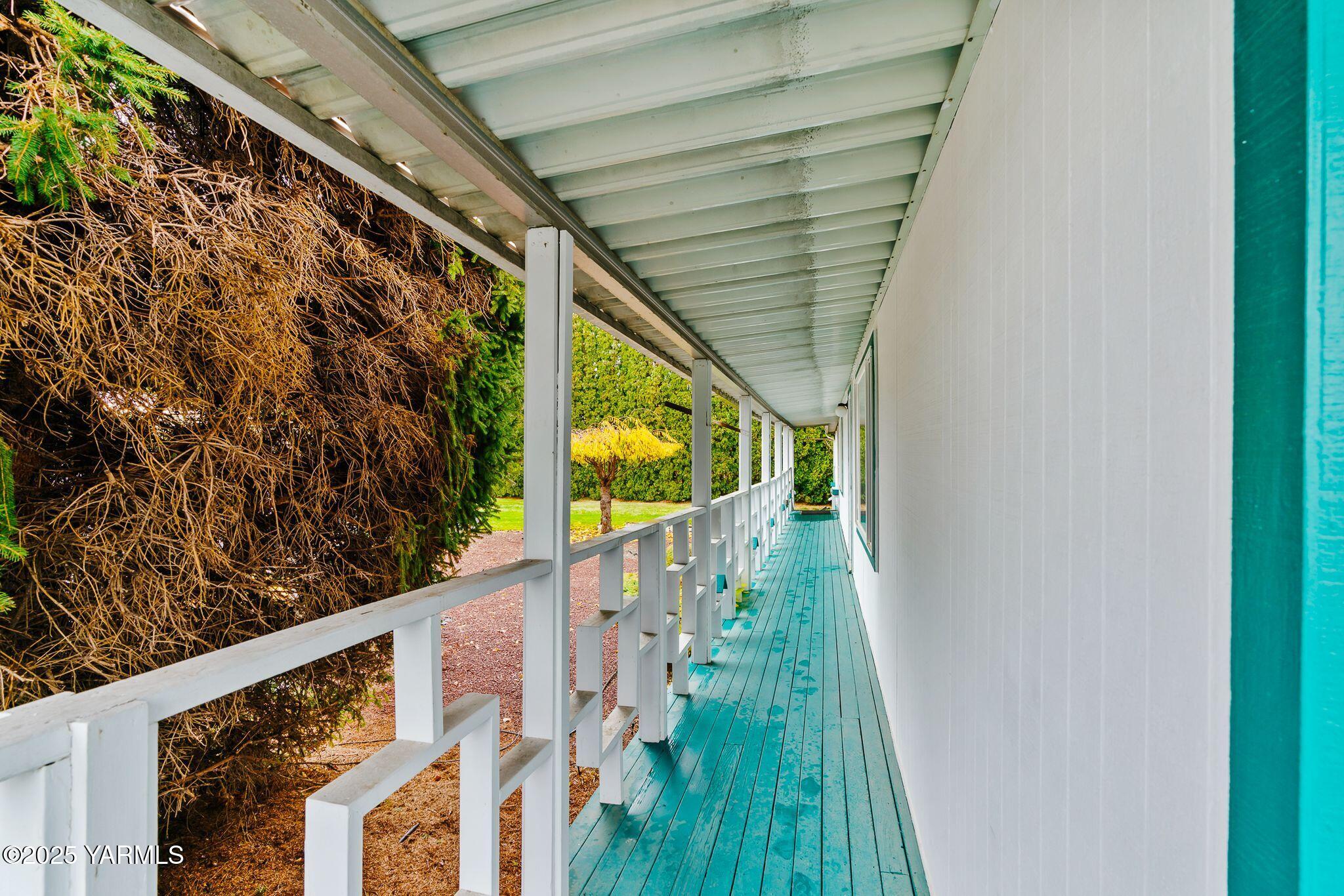 3701 Gun Club Road, Unit 43 Yakima, WA 98901 - Photo 22 of 29 a view of balcony with wooden floor and fence