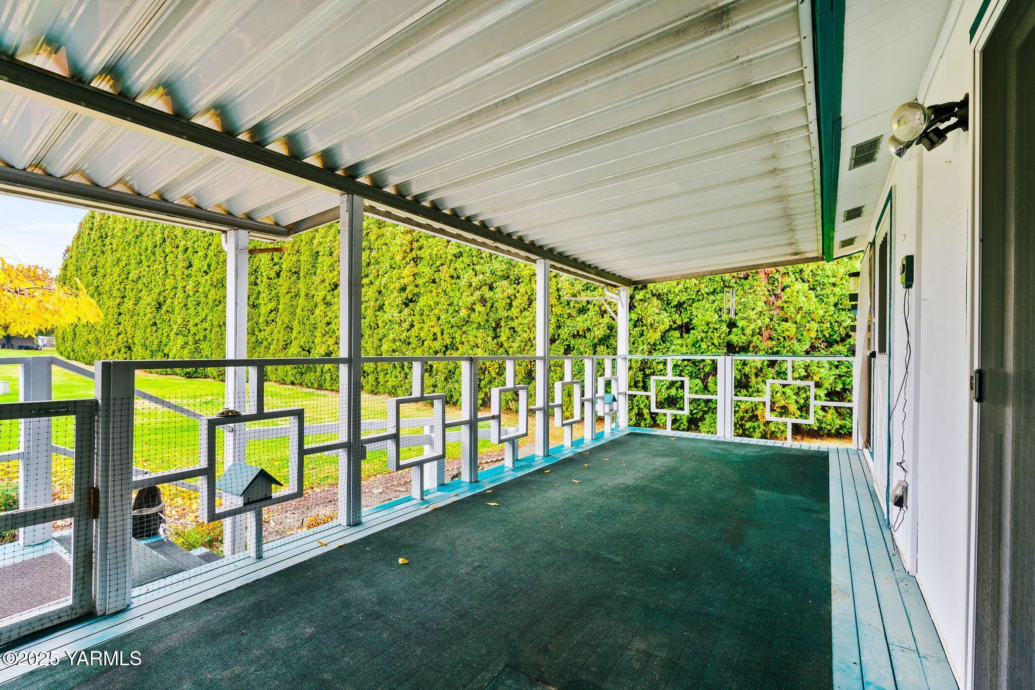 3701 Gun Club Road, Unit 43 Yakima, WA 98901 - Photo 24 of 29 a view of an empty room with a large window