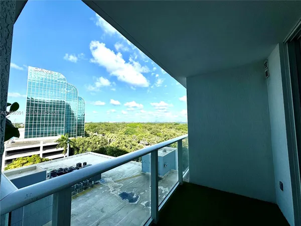 a view of swimming pool from a balcony