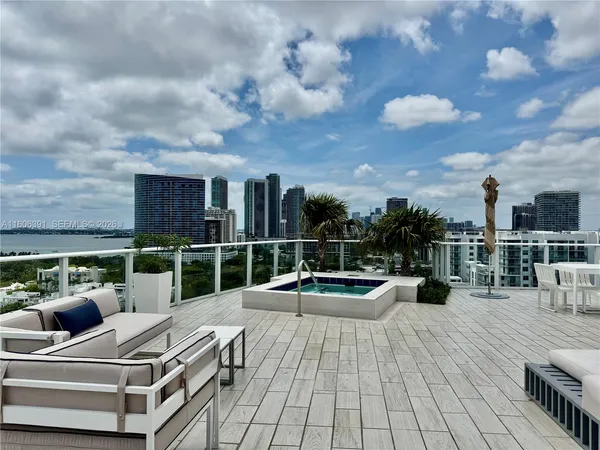 a view of a patio with swimming pool