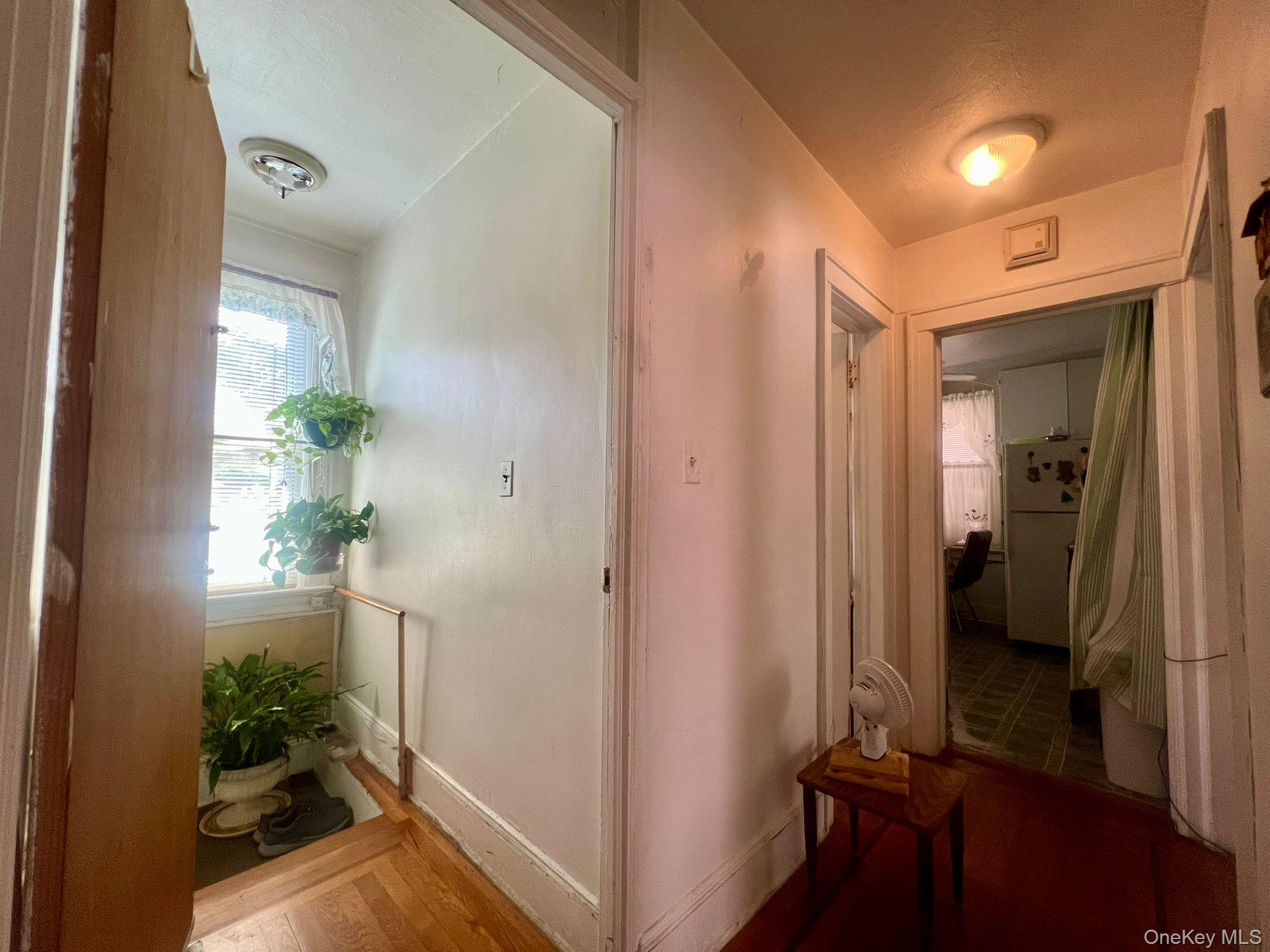 102-56 46th Avenue Queens, NY 11368 - Photo 6 of 14 a view of a hallway and interior of a house
