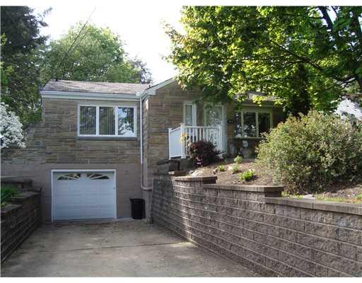 111 Conewanta Road Upper St. Clair, PA 15241 - Photo 1 of 18 Exterior Front. This charming brick stone home is situated on a spacious lot, with level front and backyards. Quiet street in desirable Brookside Farms. Attractive front door and large windows to let the sunlight in!