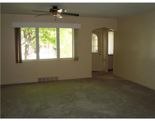 111 Conewanta Road Upper St. Clair, PA 15241 - Photo 3 of 18 Living Room. Front entryway leads to neutral colored Living Room with ceiling fan and cream painted plaster walls. Note arched doorway!