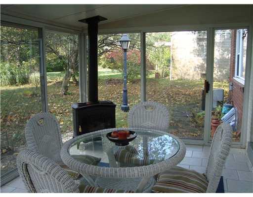 111 Conewanta Road Upper St. Clair, PA 15241 - Photo 5 of 18 Sunroom. Enjoy the ambiance of the Sunroom, with its own gas fireplace and ceramic flooring, all year round.