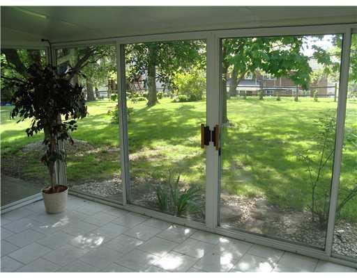 111 Conewanta Road Upper St. Clair, PA 15241 - Photo 6 of 18 View. Sunroom has sliding glass doors, and overlooks lovely backyard.