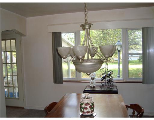 111 Conewanta Road Upper St. Clair, PA 15241 - Photo 7 of 18 Dining Room. Dining Room features cream painted plaster walls and neutral carpeting. Attractive door leads to Sunroom.