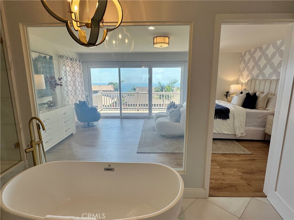 30902 Rue De La Pierre Rancho Palos Verdes, CA 90275 - Photo 43 of 66 Turn on the see through glass at master bath