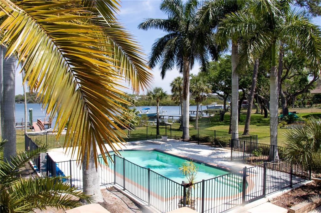 1440 Riverside Drive Tarpon Springs, FL 34689 - Photo 1 of 1 a view of outdoor space and swimming pool