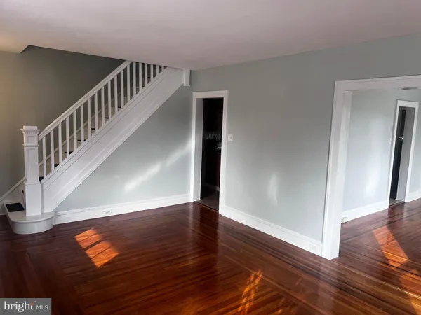 a view of entryway with wooden floor