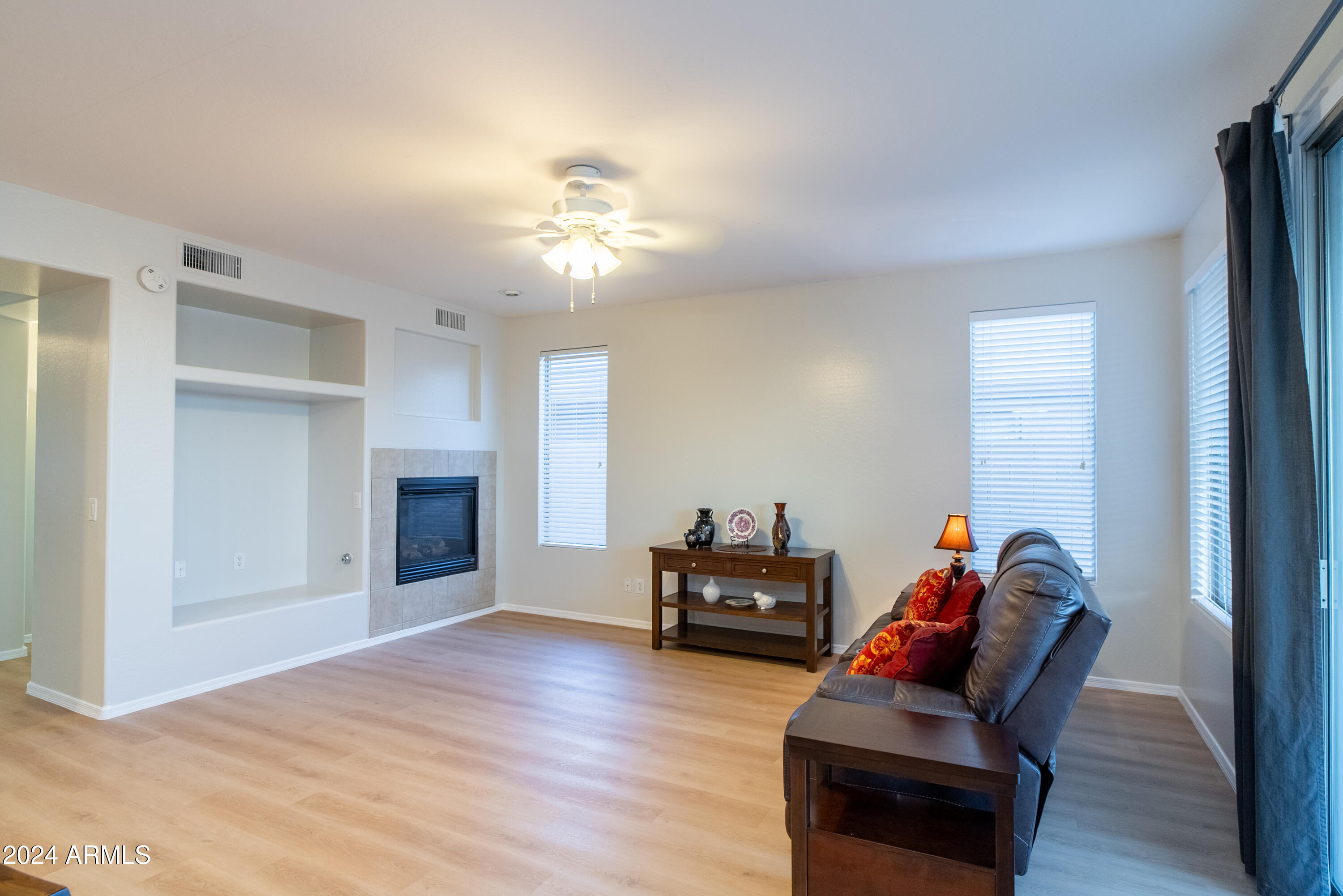 15471 West Statler Circle Surprise, AZ 85374 - Photo 13 of 32 a view of living room with furniture and wooden floor