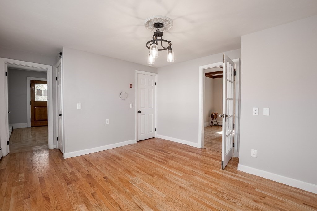 570 Canton Street Stoughton, MA 02072 - Photo 15 of 41 a view of an empty room and wooden floor
