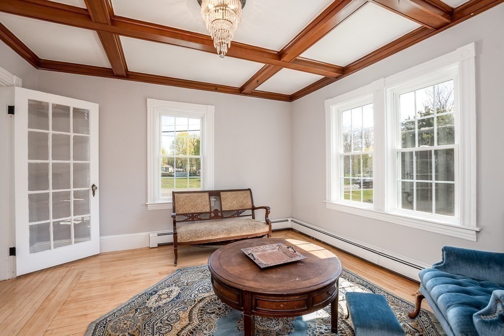 570 Canton Street Stoughton, MA 02072 - Photo 20 of 41 a living room with furniture and a window