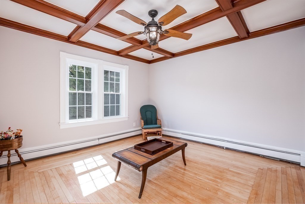 570 Canton Street Stoughton, MA 02072 - Photo 21 of 41 a living room with furniture and wooden floor
