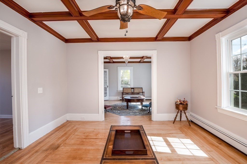570 Canton Street Stoughton, MA 02072 - Photo 22 of 41 a hallway with a couch and a rug