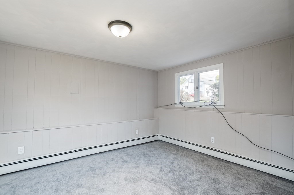 570 Canton Street Stoughton, MA 02072 - Photo 35 of 41 a view of an empty room with a window