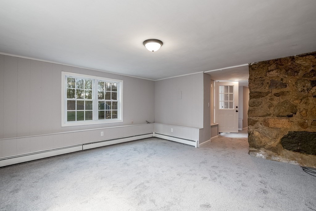 570 Canton Street Stoughton, MA 02072 - Photo 38 of 41 a view of an empty room with a window