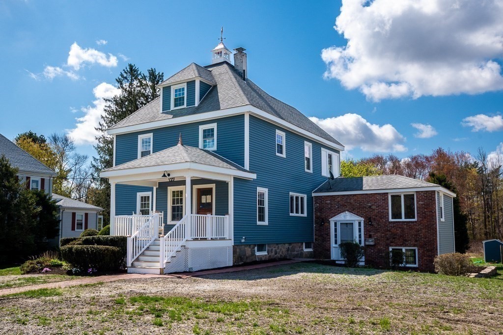 570 Canton Street Stoughton, MA 02072 - Photo 40 of 41 a front view of a house with a yard