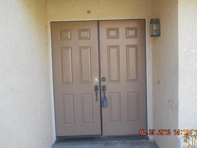 45579 Sutter Creek Road Indio, CA 92201 - Photo 3 of 21 a view of an entryway with wooden floor