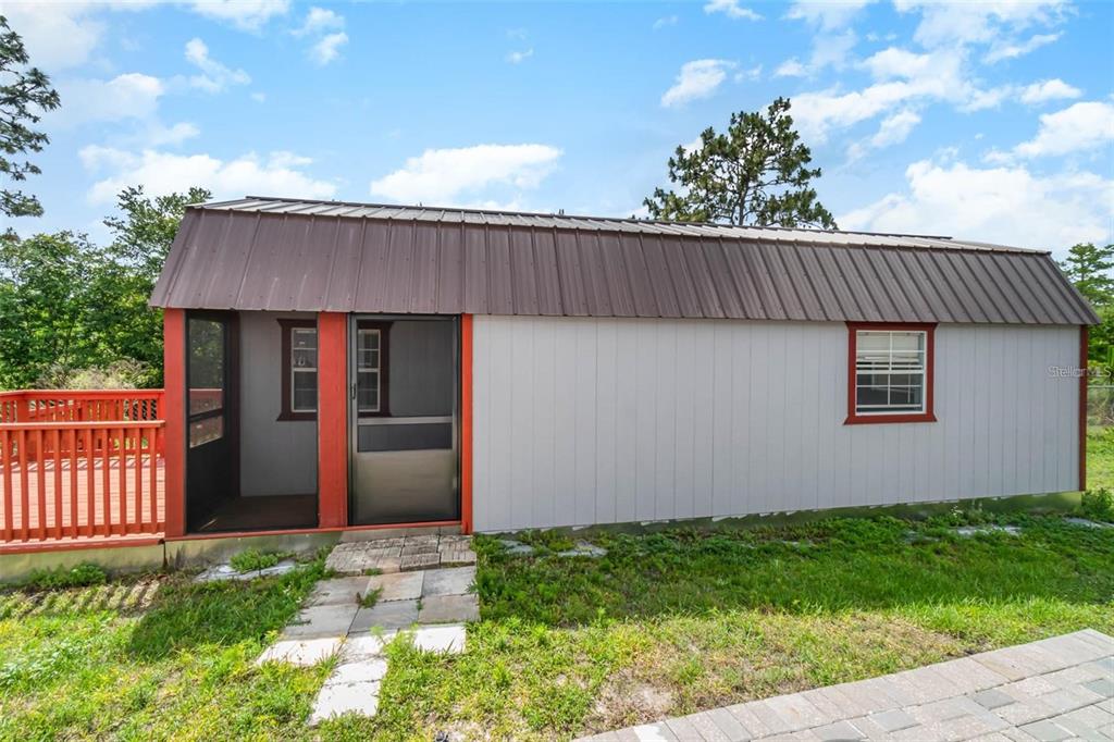 20805 Sheldon Street Orlando, FL 32833 - Photo 15 of 18 a view of a backyard