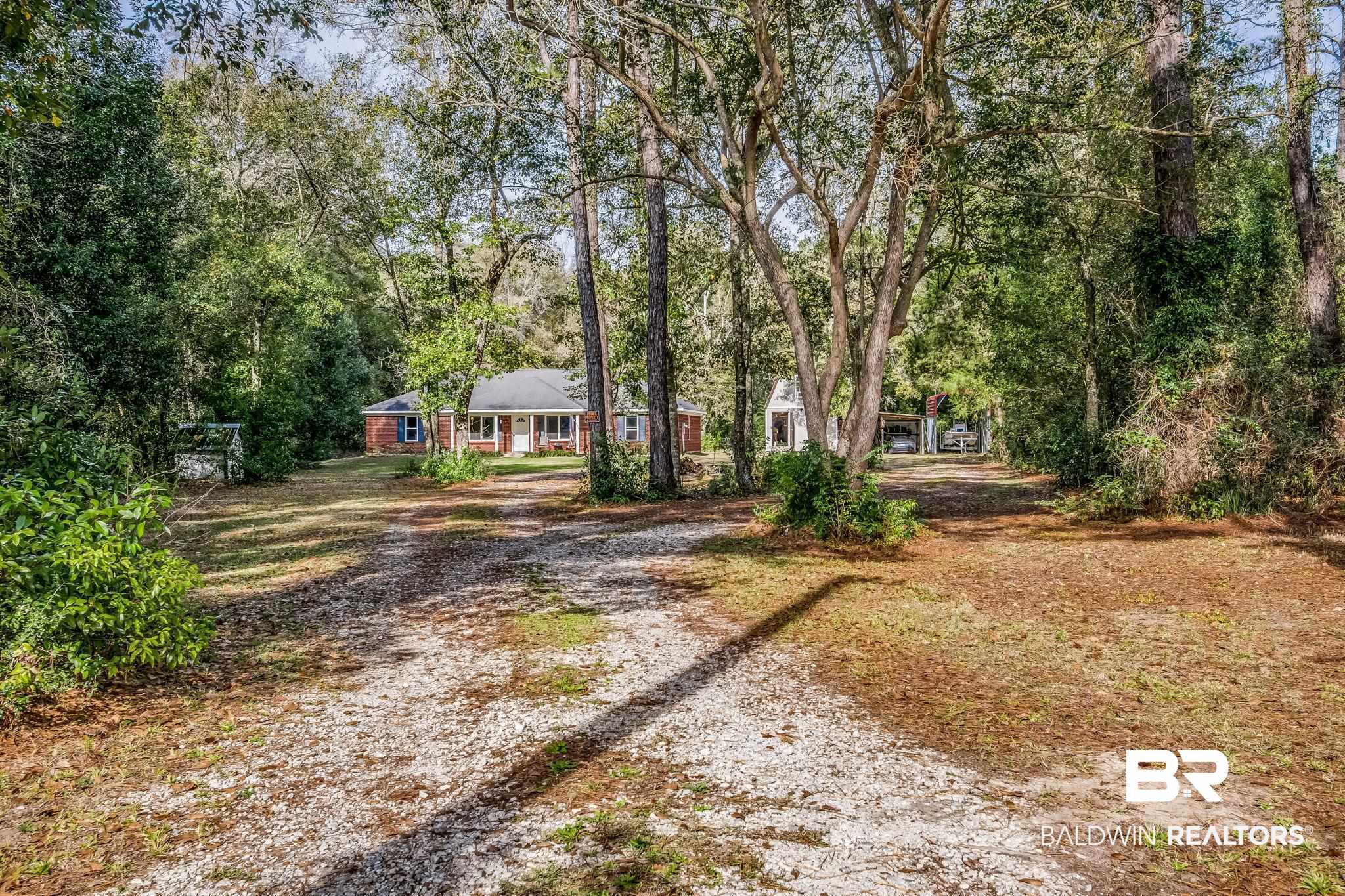 12199 Bay Road West Foley, AL 36535 - Photo 7 of 62 View of front of property with driveway