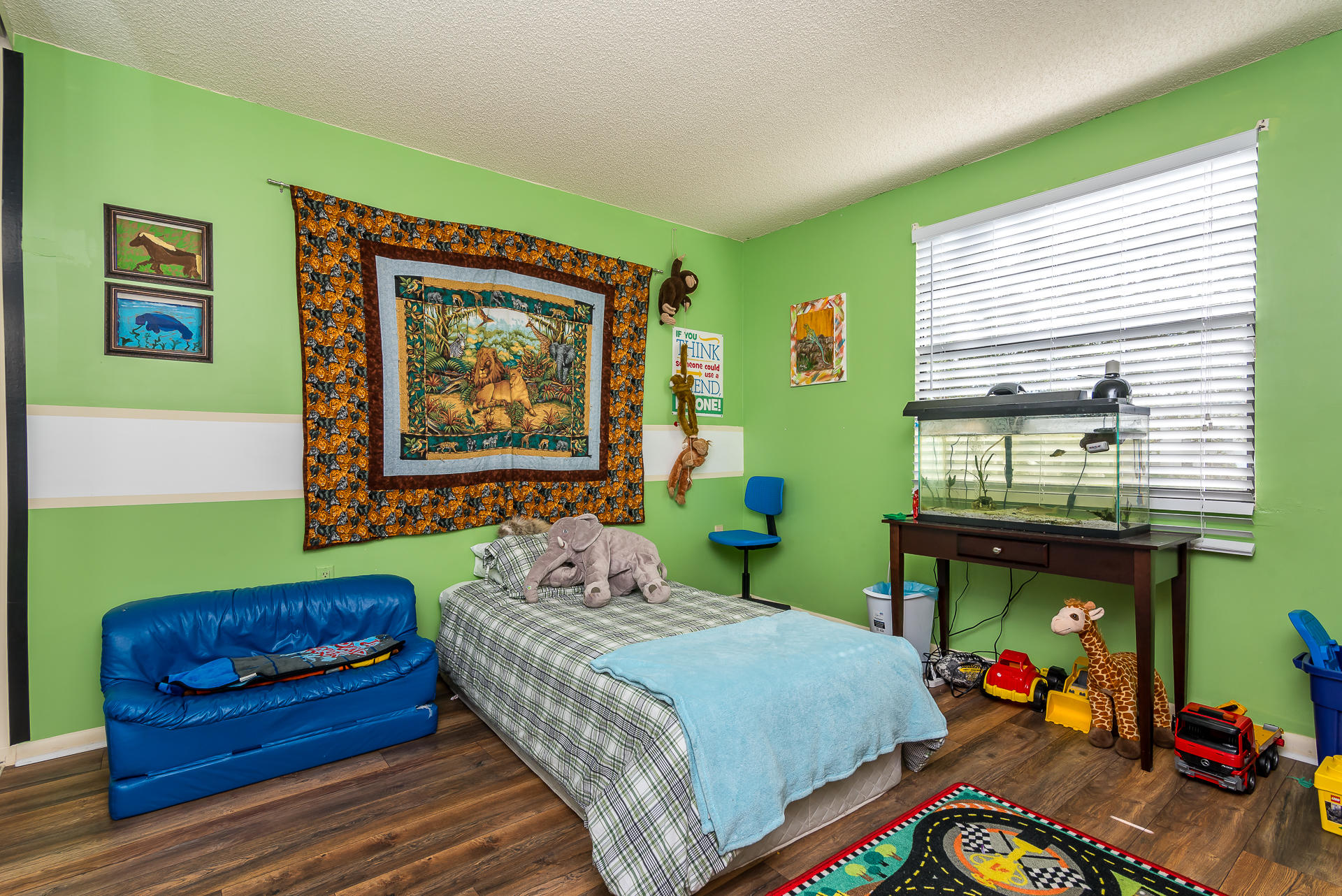 6109 Balboa Circle, Unit 206 Boca Raton, FL 33433 - Photo 16 of 18 a bedroom with a bed and a window