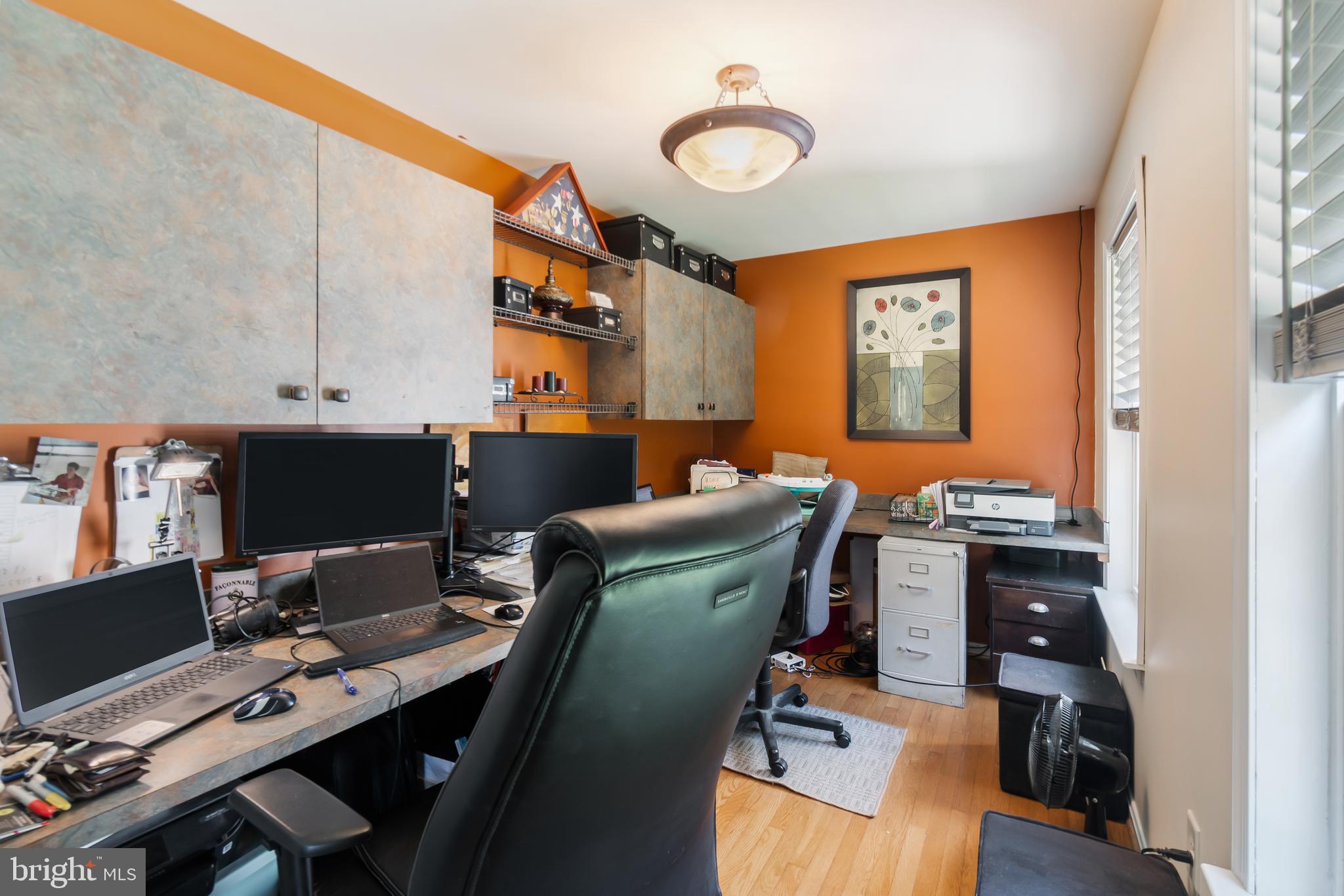 3040 Jones Road Dunkirk, MD 20754 - Photo 19 of 67 a view of a workspace with furniture and a window