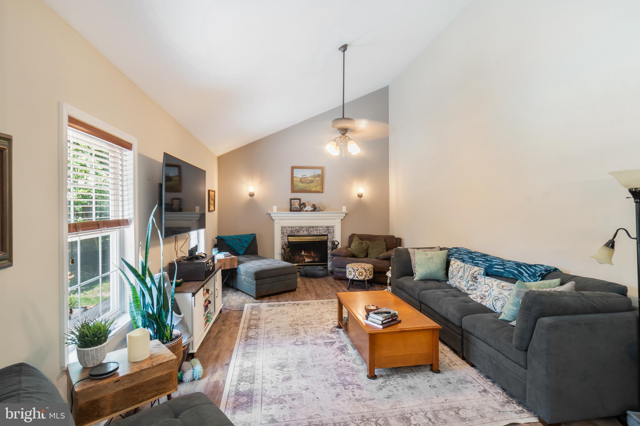 3040 Jones Road Dunkirk, MD 20754 - Photo 33 of 67 a living room with furniture and a flat screen tv