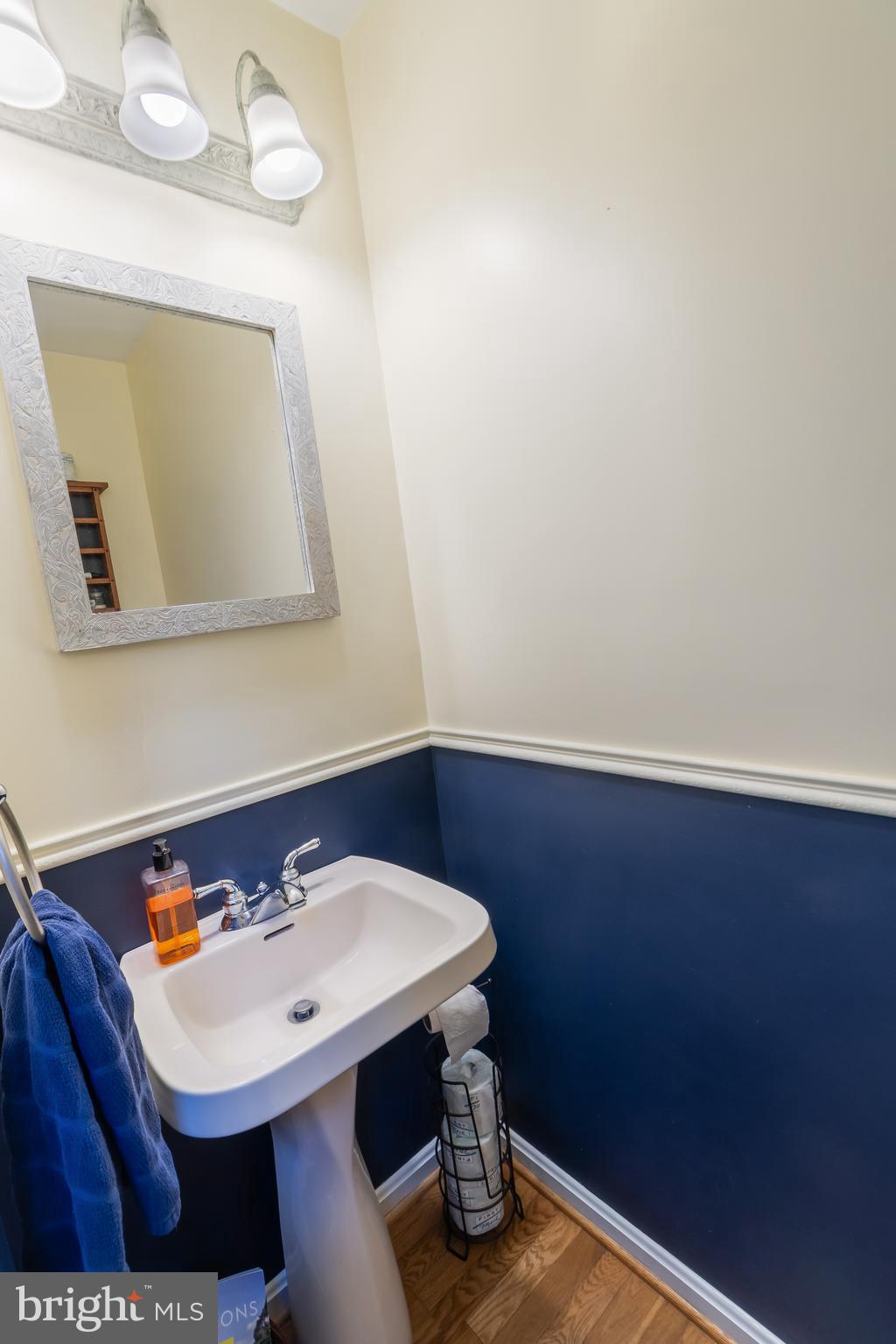 3040 Jones Road Dunkirk, MD 20754 - Photo 35 of 67 a bathroom with a sink a mirror and vanity