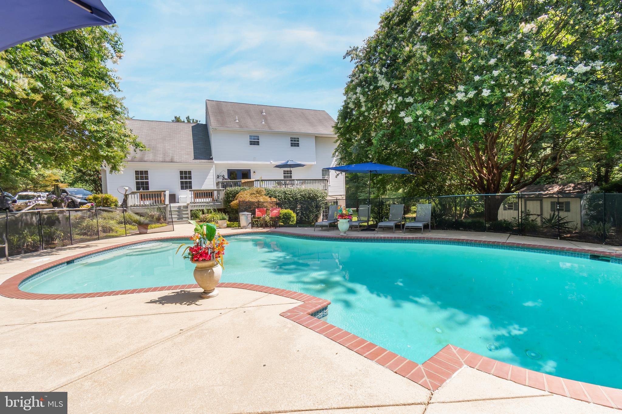 3040 Jones Road Dunkirk, MD 20754 - Photo 9 of 67 a front view of a house with garden