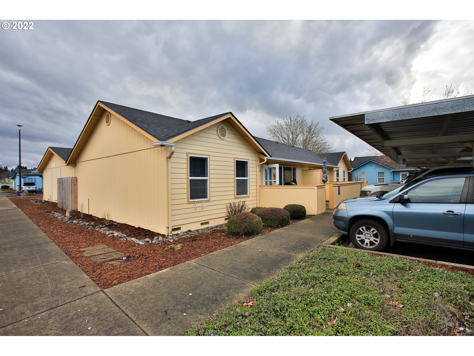 5520 E Street Springfield, OR 97478 - Photo 2 of 18 a view of a house with a yard