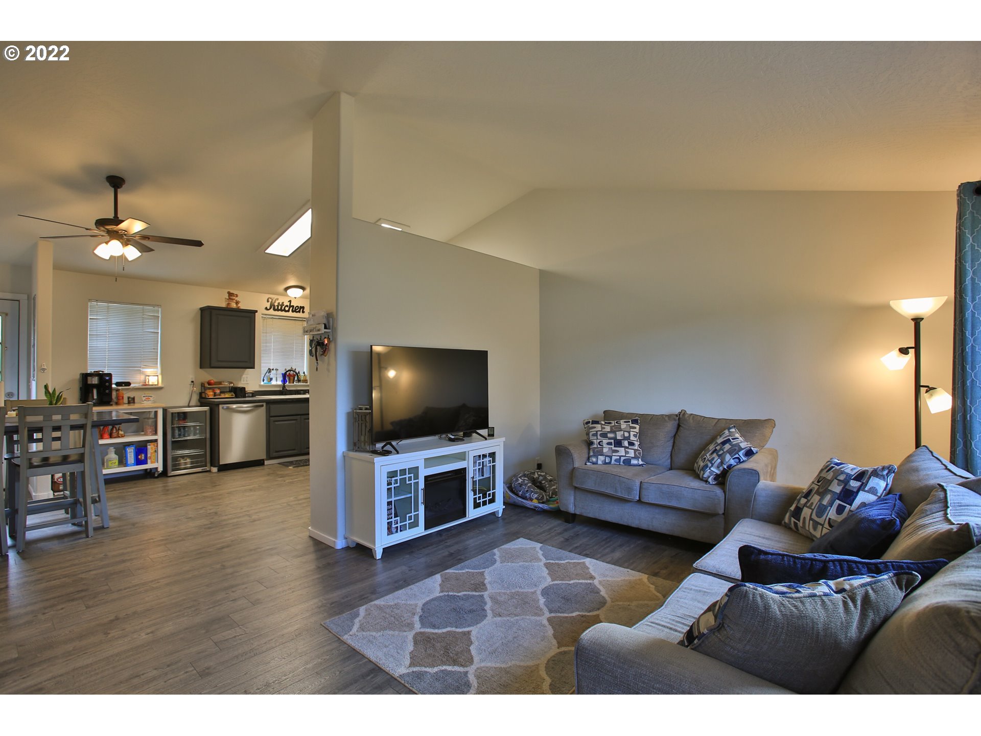 5520 E Street Springfield, OR 97478 - Photo 4 of 18 a living room with furniture and a flat screen tv