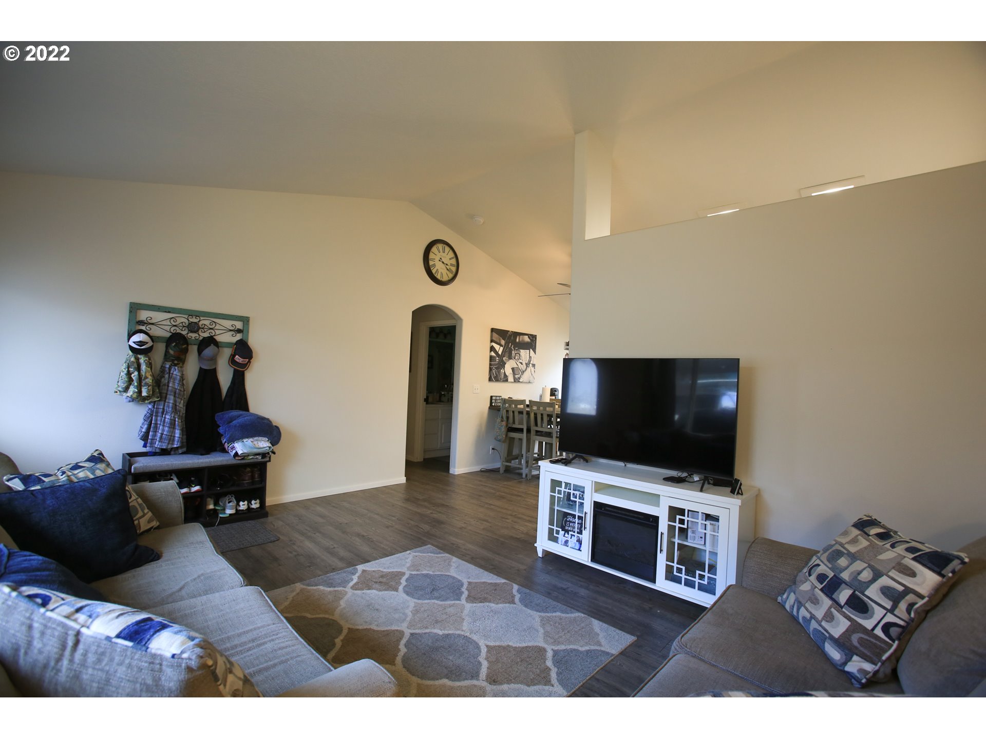 5520 E Street Springfield, OR 97478 - Photo 5 of 18 a living room with furniture and a flat screen tv