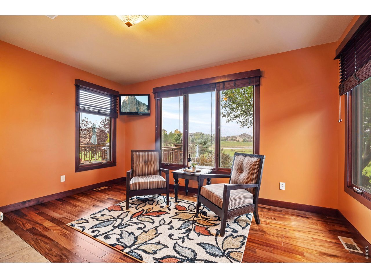 37127 Cullison Ridge Road Severance, CO 80550 - Photo 13 of 50 a living room with furniture and floor to ceiling windows