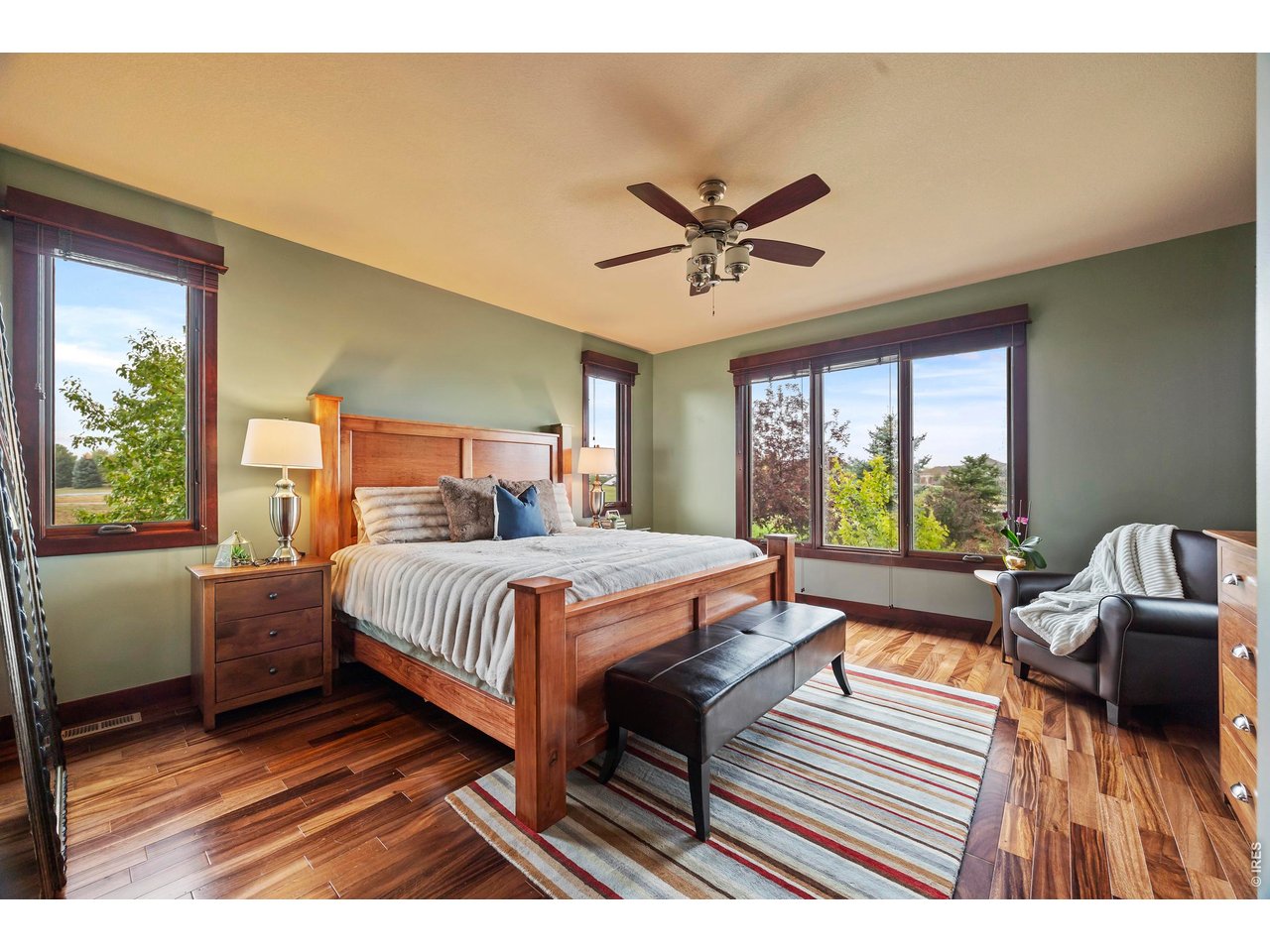 37127 Cullison Ridge Road Severance, CO 80550 - Photo 16 of 50 a bedroom with a large bed and a window