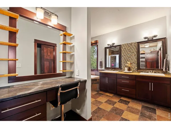 a kitchen with a sink and wooden cabinets