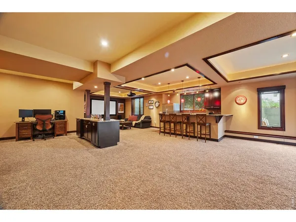 a room with furniture and a flat screen tv