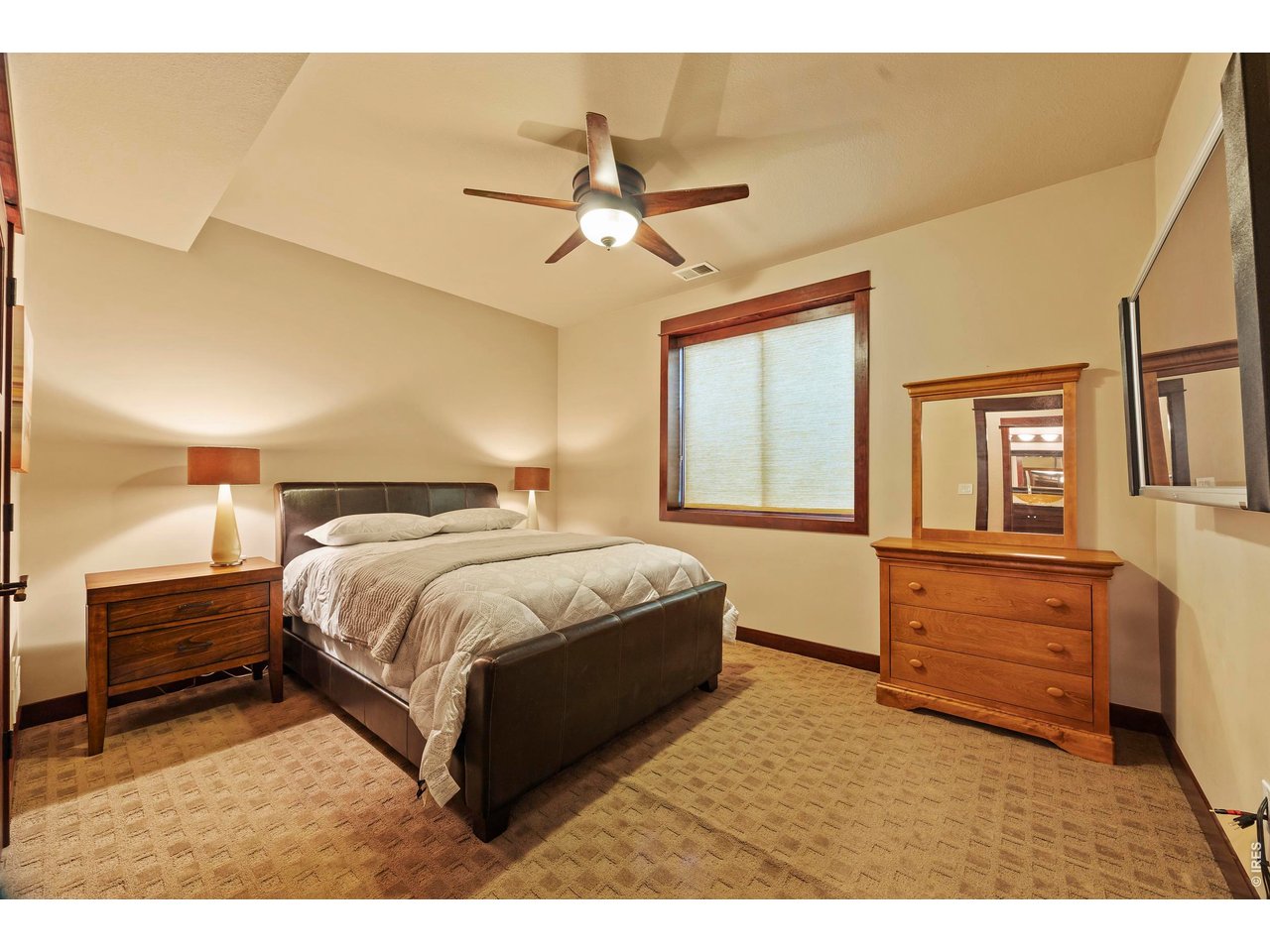 37127 Cullison Ridge Road Severance, CO 80550 - Photo 29 of 50 a bedroom with a bed and window