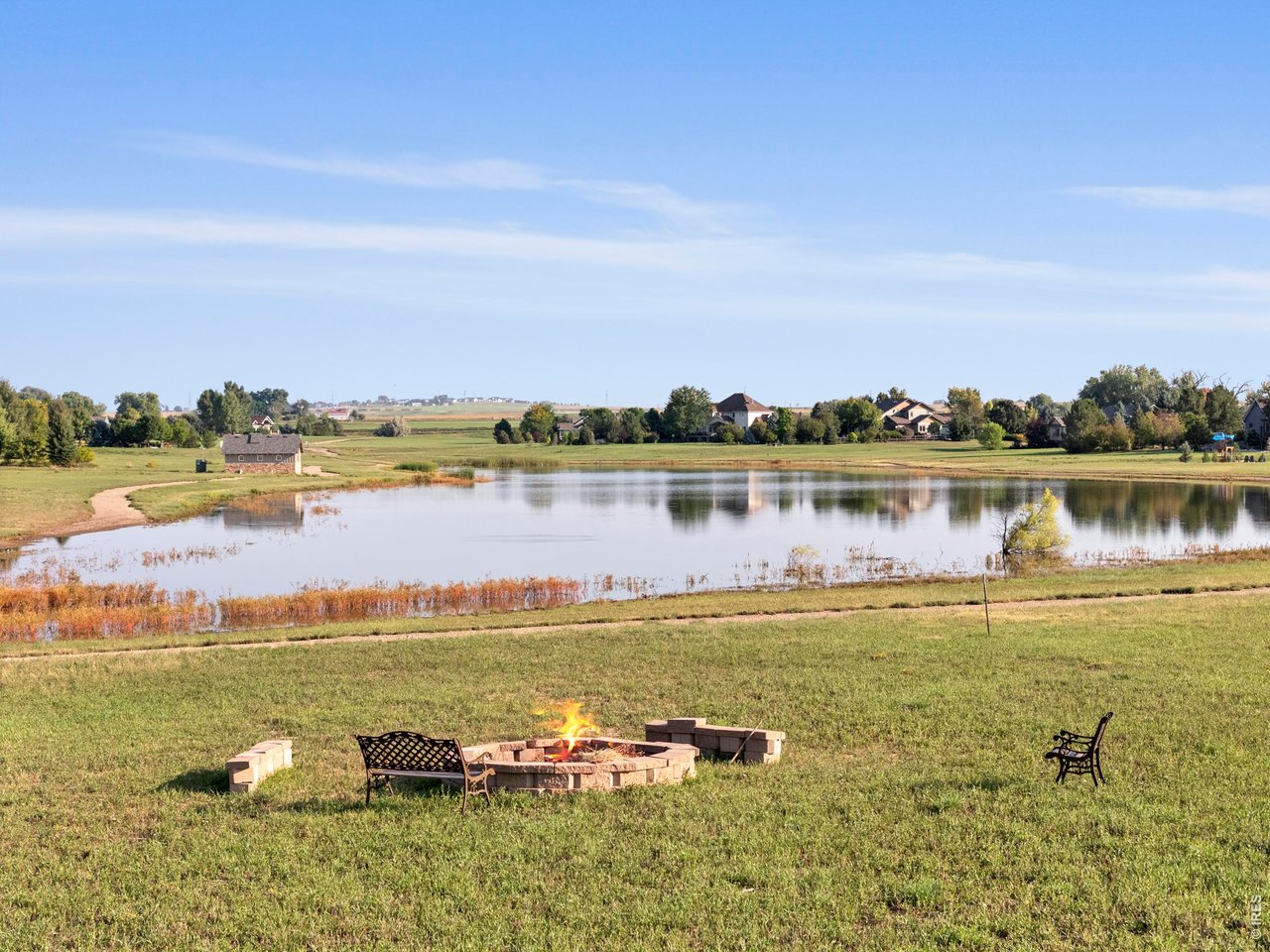 37127 Cullison Ridge Road Severance, CO 80550 - Photo 45 of 50 a view of a lake with houses