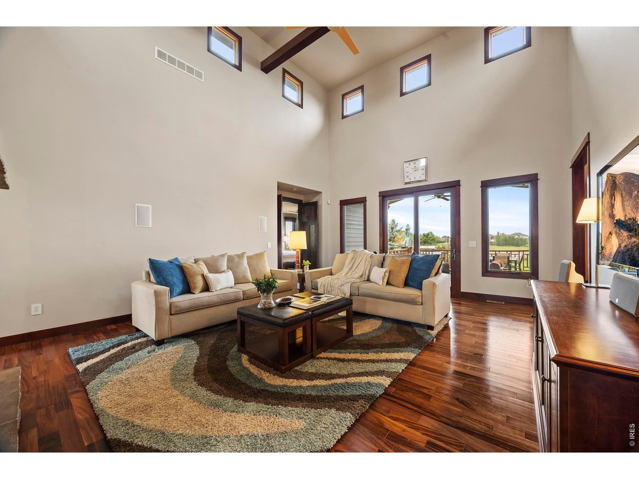 37127 Cullison Ridge Road Severance, CO 80550 - Photo 6 of 50 a living room with furniture and a wooden floor
