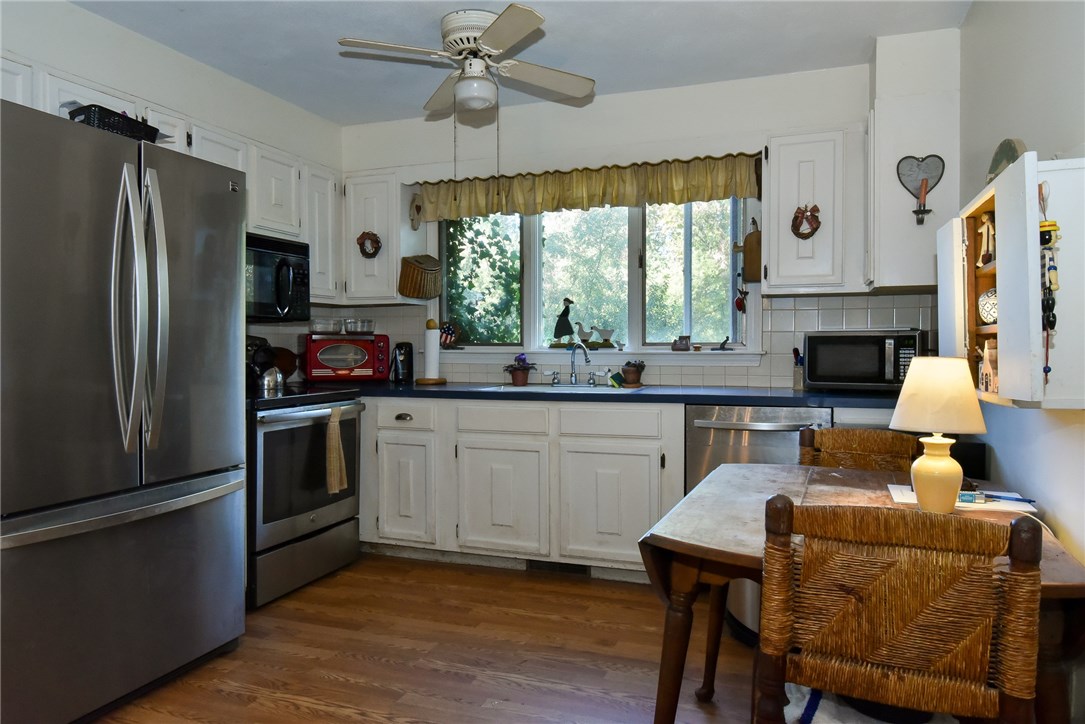 945 Cowesett Road Warwick, RI 02886 - Photo 5 of 14 Kitchen with stainless appliances