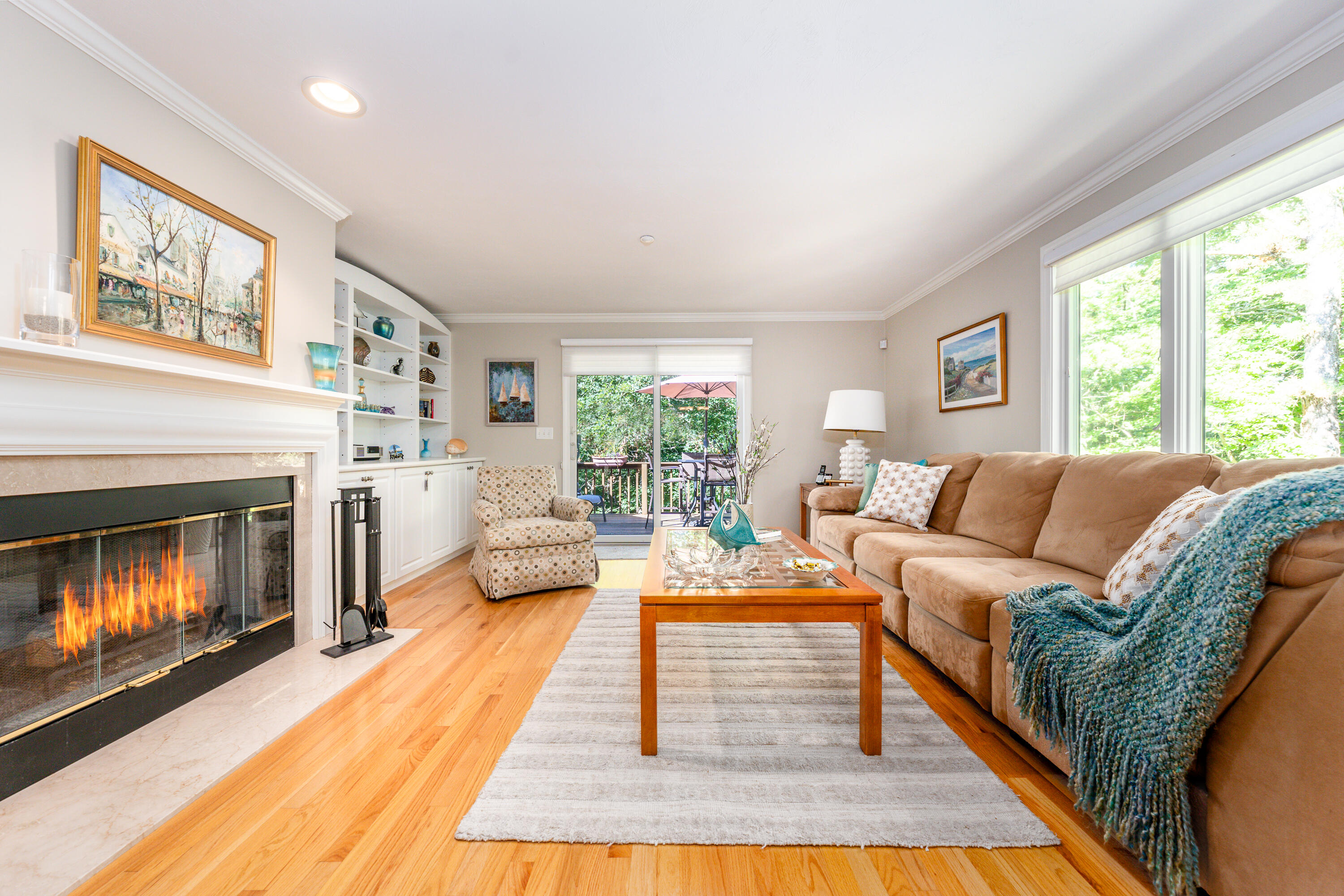 12 North Ridge Road Mashpee, MA 02649 - Photo 8 of 32 a living room with furniture large window and a fireplace