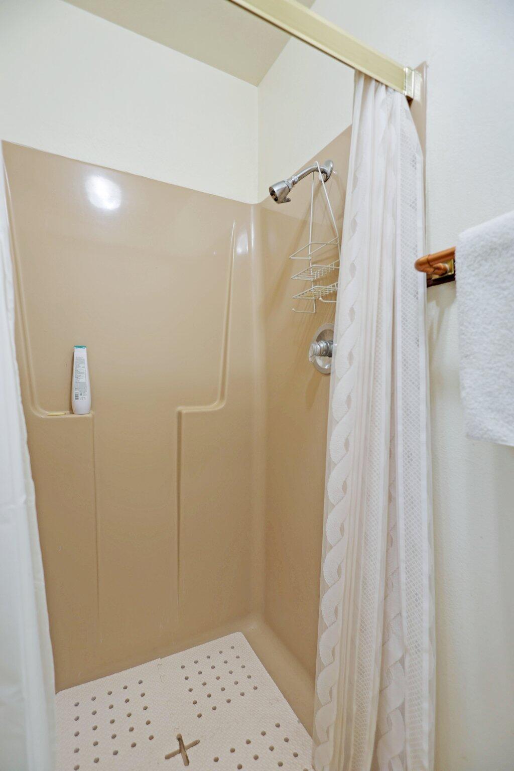 21800 Cedar Ridge Road Manton, CA 96059 - Photo 16 of 35 a bathroom with a shower and a sink