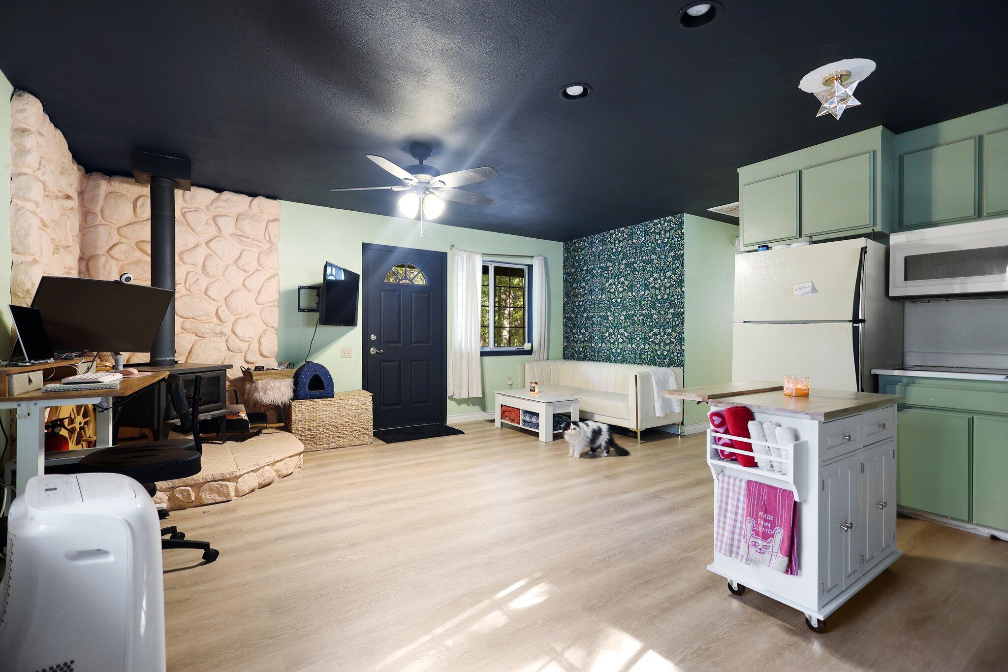 21800 Cedar Ridge Road Manton, CA 96059 - Photo 24 of 35 a bed room with furniture and a flat screen tv