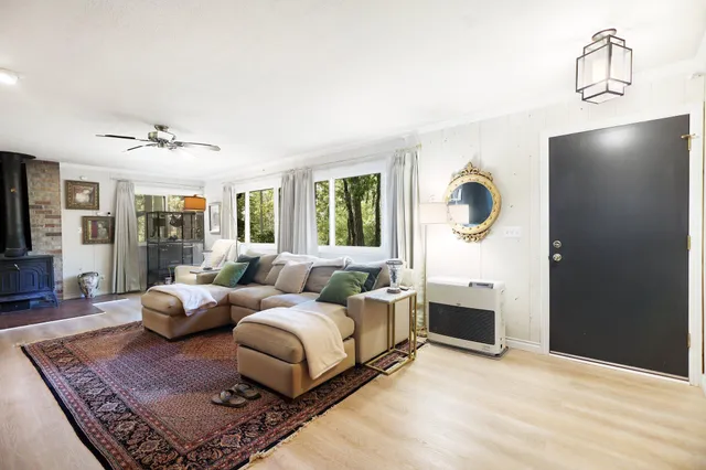 a utility room with cabinets washer and dryer